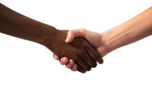 two people shaking hands over a white background