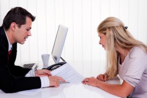 female employee meeting with employment lawyers in an office