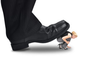 an employee getting stepped on by a large shoe