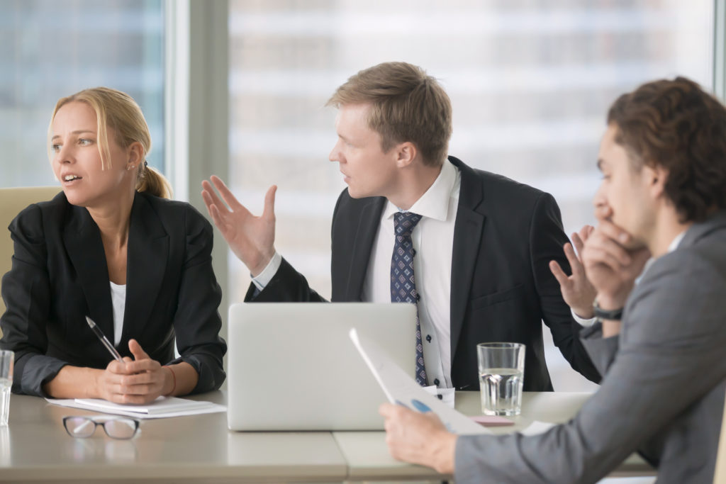 boss yelling at a female employee